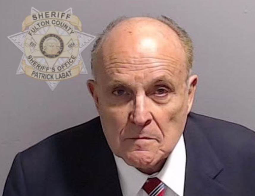 EXCLUSIVE: Mayor Rudy Giuliani humiliating mugshot and posting $150k bail on surrender in election fraud&nbsp;case.