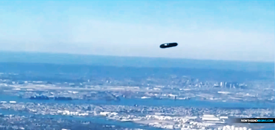 Shocked Airline Passenger Sees UFO Flying Outside Her Plane And Snaps What Just May Be The Clearest Image Yet Of An Unidentified Flying Object