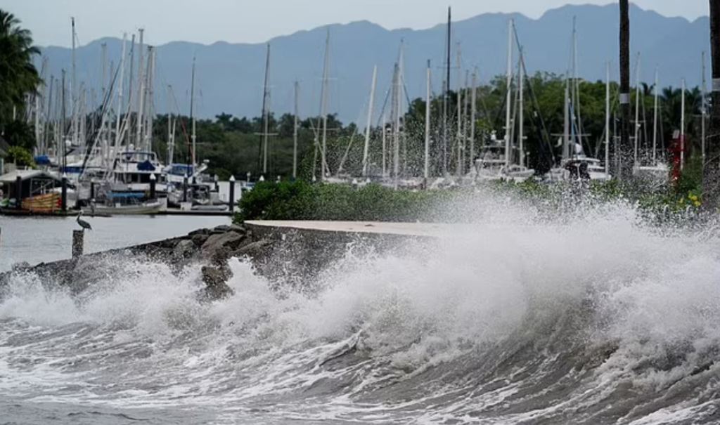 ‘Extremely dangerous’ hurricane Lidia kills one as it slams into Mexico’s Puerto Vallarta coastal city with 140mph winds triggering landslides and downing&nbsp;trees