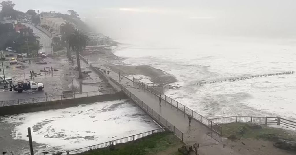 California braces for third day of towering FORTY foot waves that have damaged oceanside mansions – as foolish locals flock to piers and lifeguard almost drowns while trying to rescue one thrill&nbsp;seeker