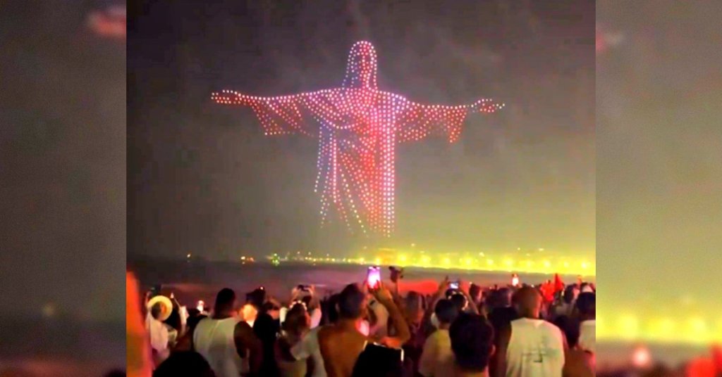 Millions in Rio de Janeiro cheer as drones form giant image of Christ the Redeemer emerging from the sea during New Year’s Eve&nbsp;celebrations